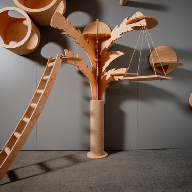 Modern wooden cat tree in the shape of a palm trees - a stylish complex for climbing and resting cats